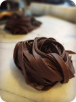 This savory chocolate pasta, I was told by a chef in Montalcino, Tuscany, is best served with a cream sauce..preferable an alfredo type sauce with extra Pecorino Romano for topping.