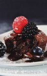 Dig into a rich and delicious Chocolate Molten Lava Cake and cue the ooey-gooey centers. This recipe is easy to make–and will impress any dinner guest!