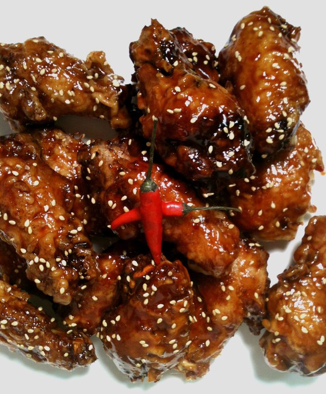 Here is yet another Korean fried chicken recipe that we made recently with a sweet & spicy glaze. We have been yearning for something hot and spicy and we finally got it.
