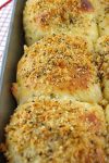 These Parmesan Dinner Rolls are loaded with freshly grated Parmesan to make a gorgeous, light, fluffy and moist dinner roll full of Parmesan flavor.