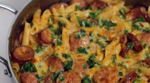 This spicy sausage pasta cooks in one pot and it's ready in no time! It's got so much flavor and a little kick at the end of every bite!