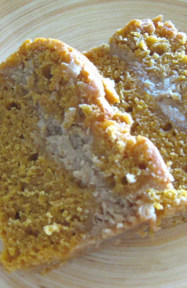 Pumpkin Spice Bread with Maple Cheesecake Layer - I have made Pumpkin Bread for years.....and always smeared it with cream cheese, and the thought of flavored cream cheese baked into the bread hooked me.