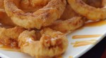 Recipe for Dessert Apple Rings With Cinnamon Cream Syrup – These crispy apple rings are warm and comforting on a cool fall day – and such a unique dessert! I love these sprinkled with cinnamon sugar and then drizzled with syrup.