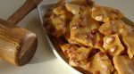 Peanut brittle is a delicious and fun candy and is very easy to make by melting sugar with your favorite nuts.