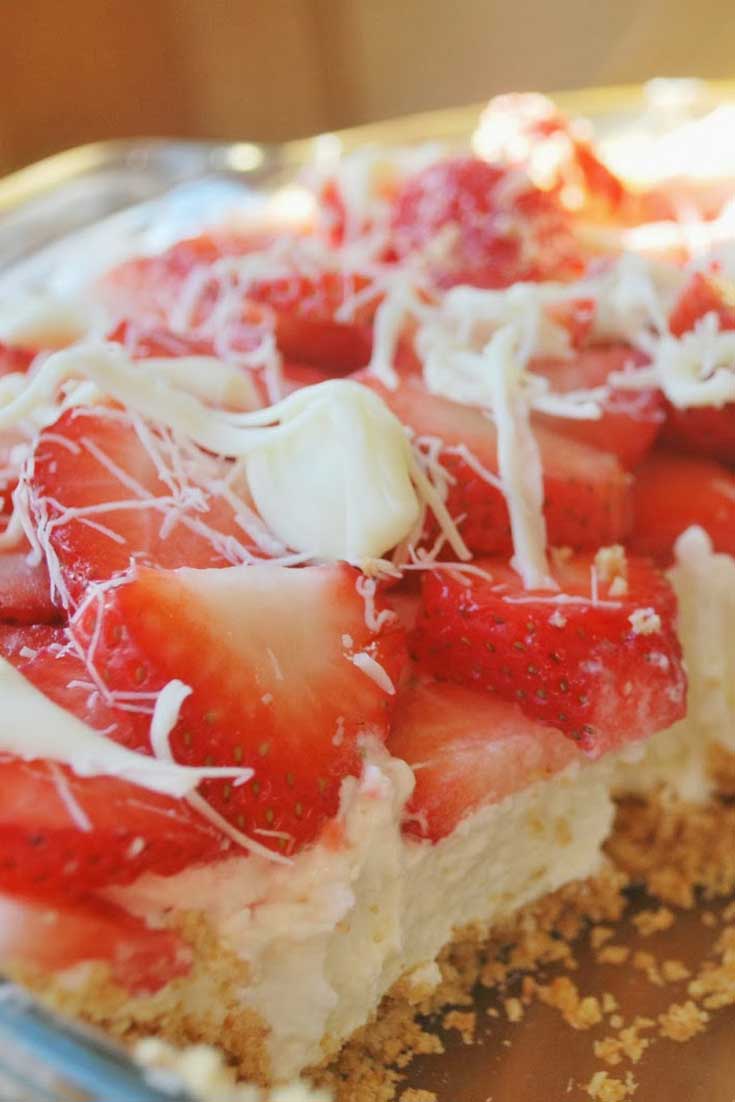 This Strawberry White Chocolate Pie an amazing pie! It is creamy and the taste is delicious.  So if you can find some amazing strawberries, before the season is over, get some now and make this pie! #strawberry #pie #dessert #chocolate