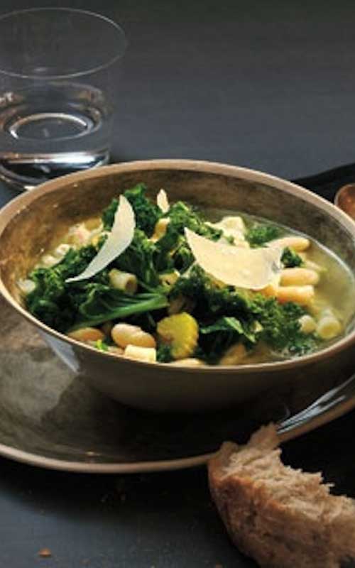 Recipe for Healthy Kale And Bean Soup - A hearty and healthy rustic Tuscan-style soup recipe that is quick, easy, and sure to impress.