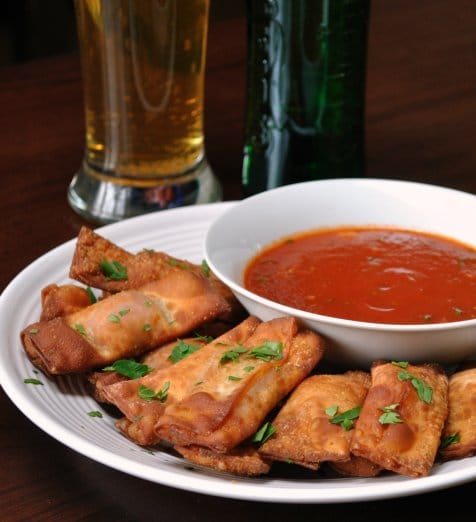 Crisp, homemade pizza rolls stuffed with pepperoni, gooey cheese, and fresh basil. Warm marinara makes a quick, tasty accompaniment.