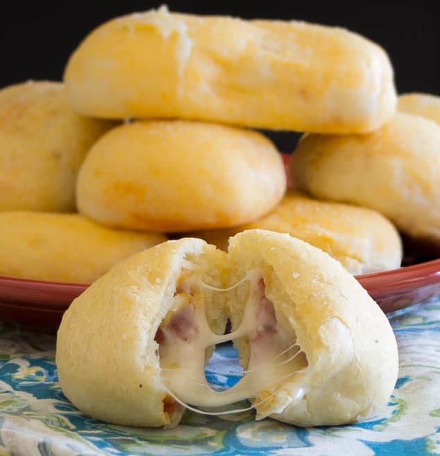 These Pepperoni Pizza Rolls are soft and full of delicious cheesy goodness. Best of all they fit perfectly in your hand, and are better than anything that you can get frozen!
