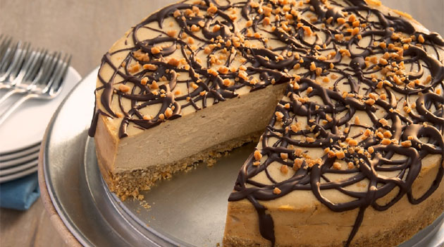 Rich, thick, and silky – this Chocolate Drizzled Peanut Butter Cheesecake is packed with peanut butter flavor.