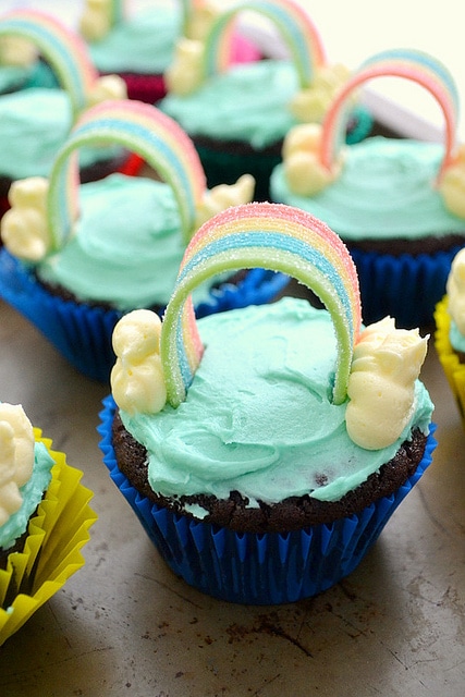 These "somewhere over the rainbow" cupcakes are the perfect dessert to serve at a Wizard of Oz themed party. All you need are a couple of ingredients and some creative intuition to bake these colorful cupcakes at home.