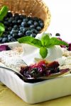 Blueberry Cobbler Recipe – Blueberry Cobbler has a layer of fresh blueberries covered in a cake-like cobbler topping. Serve with a scoop of ice cream for a delicious summer dessert.