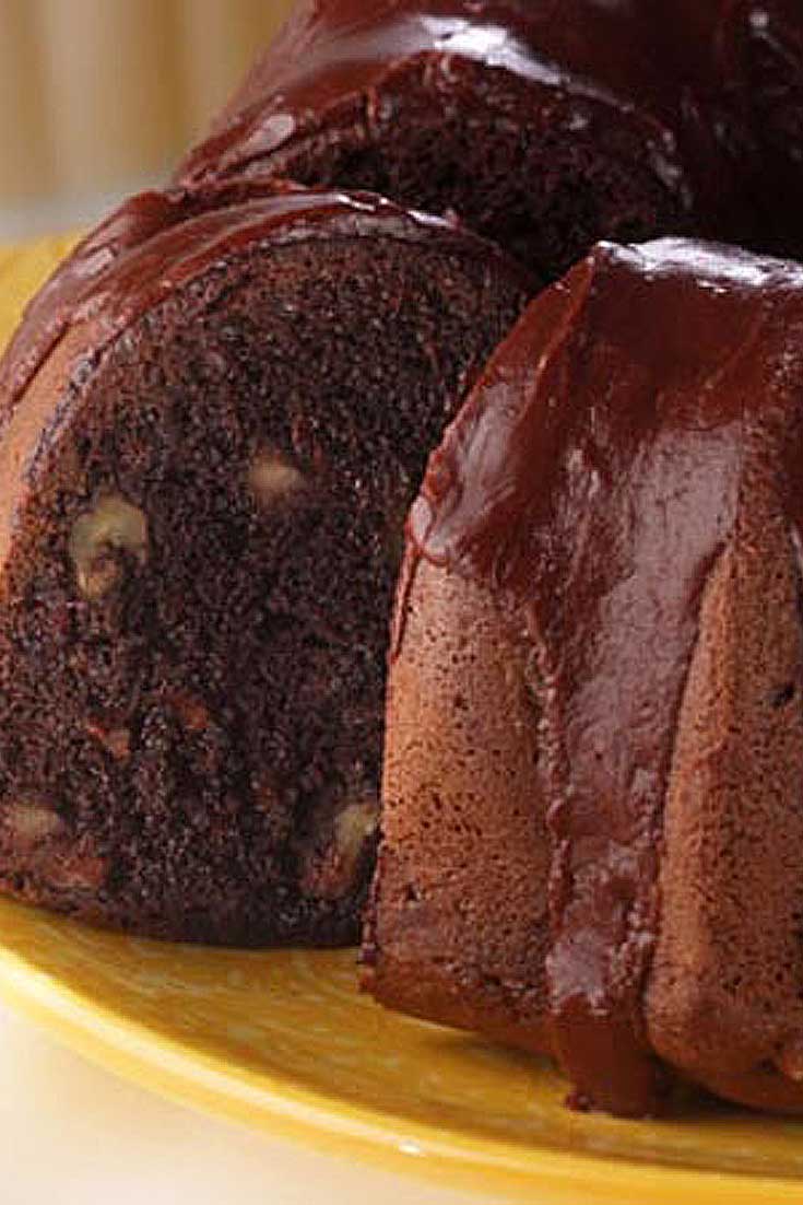 Choco-Holic Cake Recipe - Super simple, show stopping, chocoholics dessert. Chocolate, chocolate and more CHOCOLATE. This cake is rich, moist, dense, fudgy, and – as if you couldn't tell – filled with C-H-O-C-O-L-A-T-E
