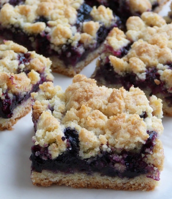 Blueberry Crumb Bars - These are so good and super simple to make. The base and crumble mix in this is universal and can be used with any type of fresh or frozen berries.