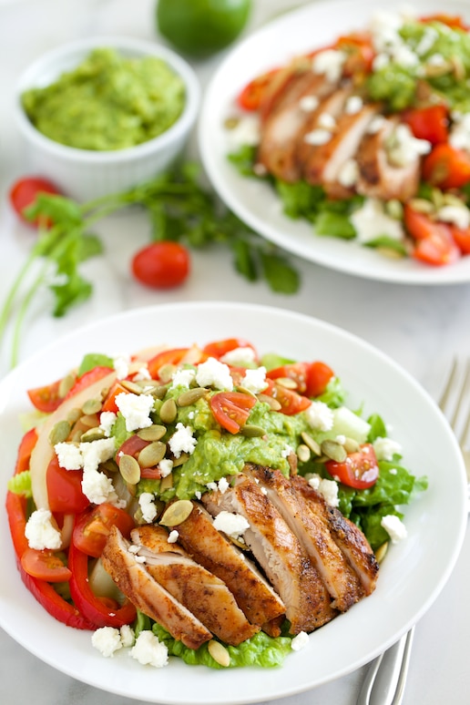 Spice up your dinner with this delicious Grilled Chicken Fajita Salad with Guacamole Dressing! Just don't count on any leftovers.