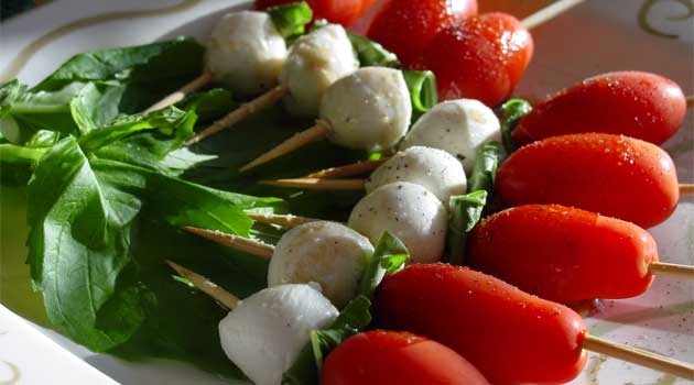 A simple twist on a traditional Caprese salad, these colorful Caprese Salad Skewers are the perfect easy, no-cook appetizer!