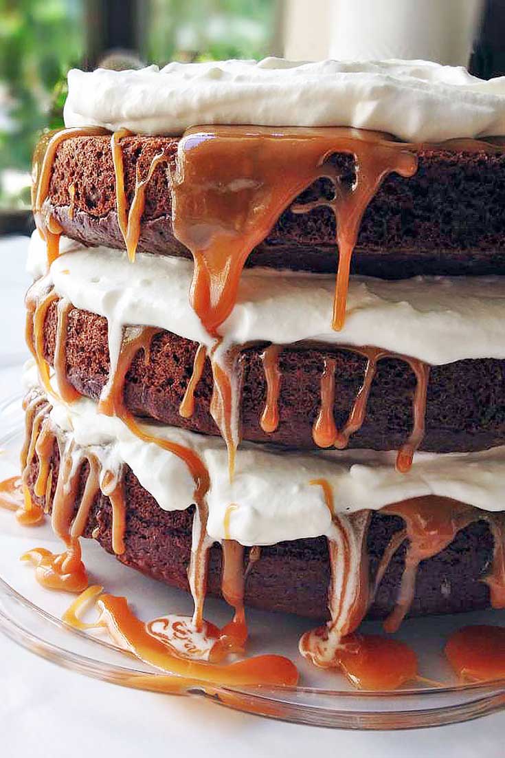 You need this Caramel Macchiato Cake in your life! It has everything you love about the classic Starbucks drink: 3 layers of rich espresso cake, whipped cream frosting, and caramel filling!