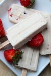 A creamy and decadent ice cream treat made with Jell-O pudding mix. These Strawberry Vanilla Bean Cheesecake Pudding Pops are quick and easy to throw together for a party or just to have on hand as a summertime treat!