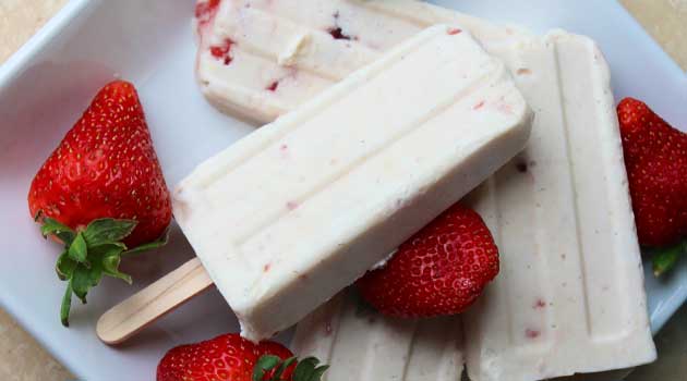 A creamy and decadent ice cream treat made with Jell-O pudding mix. These Strawberry Vanilla Bean Cheesecake Pudding Pops are quick and easy to throw together for a party or just to have on hand as a summertime treat!