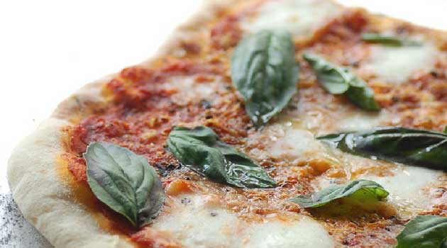 There is no need to order pizza after you learn how to make this Classic Pizza Margherita at home.
