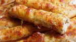 Easy Cheesy Breadsticks Recipe – Amazing that refrigerated pizza crust from a can would result in something so good. I served these as an appetizer. Addictive, hard to stop eating these!