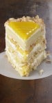 Recipe for Lemon Coconut Cake – Tangy lemon filling between layers of tender white cake. Top it all off with a rich coconut-cream cheese frosting. It’s no wonder some people think that it is one of the best cakes they’ve ever eaten.