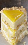 Tangy lemon filling between layers of tender white cake. Top it all off with a rich coconut-cream cheese frosting. Some people think that it is the best cake they’ve ever eaten.