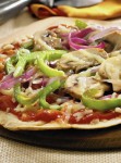Next time they ask for pizza, you can feel good about saying “yes!”, with this Skinny Pizza recipe. Flour tortillas make for a crispy crust, perfect for loading with tomato sauce, cheese, and lots of fresh veggies.